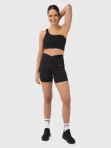 Top deportivo de un hombro con diseño asimétrico y banda elástica inferior para mayor soporte. Cuenta con almohadillas removibles.