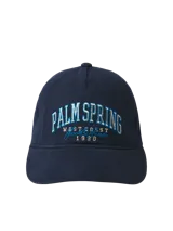 Gorra de béisbol azul marino con bordado frontal de la inscripción "Palm Spring West Coast Jack & Jones 1990" en color celeste.