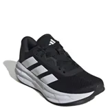 Championes Adidas Galaxy 7 W, color negro con detalles blancos y las tres tiras características de la marca en los laterales.