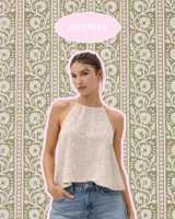 Top halter color natural, confeccionado en lino con bordado floral en tono blanco o natural.