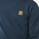 Buzo de cuello redondo Rip Curl, confeccionado en algodón con efecto lavado, manga larga y puños acanalados. Presenta un pequeño parche con logo en el pecho.