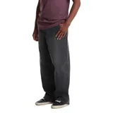 Pantalon jean de corte muy relajado, color negro con efecto lavado y ligero desgaste en los muslos.