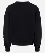 Saco de algodón color negro con cuello redondo y diseño de bordado floral en color blanco en el frente y las mangas.