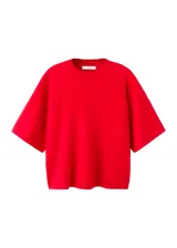 Chaleco rojo de punto con cuello redondo y mangas cortas holgadas.