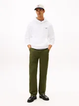 Buzo con capucha y cordones de ajuste, color blanco, de corte clásico con bolsillo tipo canguro frontal y puños y dobladillo acanalados. Cuenta con el logotipo de la marca bordado en el pecho.