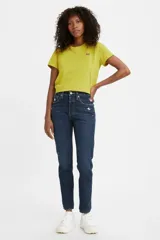 Jeans Levi's modelo 501 Skinny de tiro alto, confeccionados en denim premium selvedge color azul oscuro con efecto desgastado. Presentan corte ajustado en la pierna, bragueta con botones y diseño clásico de cinco bolsillos.