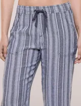 Pantalón de lino blanco, marca Dash, con pretina ancha elastizada, lazo de ajuste y bolsillos inclinados en el frente.