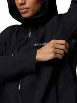Campera cortaviento impermeable y transpirable Columbia Trailborne 2.5L de color negro, con capucha integrada, cierre frontal bidireccional y bolsillos con cierre.