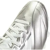 Championes de fútbol Adidas Copa Pure IV Club para terreno firme y multiterreno, modelo color plateado y blanco con las icónicas tres tiras de la marca en el lateral.