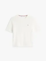 Cardigan de manga corta Tommy Hilfiger de cuello redondo, color blanco, con tejido acanalado y logo bordado en el pecho.