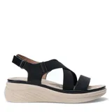 Sandalias de plataforma con tiras cruzadas elásticas y tira frontal con textura geométrica. Cuenta con ajuste de velcro en el talón y suela ergonómica.