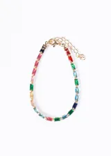 Pulsera tennis recta con zirconias multicolor y cadena dorada.