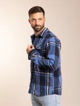 Camisa a cuadros blanca, negra y marrón, de corte regular y manga larga.