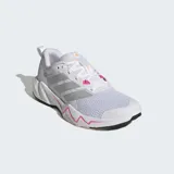 Championes de entrenamiento Adidas Rapidmove Go, diseñados para actividades de alta intensidad y gimnasio. Presentan un exterior de malla transpirable en color blanco con las icónicas tres tiras laterales en gris y detalles en fucsia. Incorporan tecnología Lightmotion en la mediasuela para una amortiguación ultraligera y tecnología Climacool para mayor frescura.