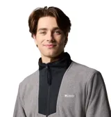 Campera polar Columbia modelo Sequoia Grove, color gris con detalles en negro en el cuello y la parte superior frontal. Cuenta con cierre frontal completo, bolsillos laterales con cierre y logo de la marca bordado en el pecho.