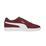 Championes Puma modelo Smash 3.0, color bordó con la icónica franja lateral en blanco y logo Puma en dorado. Confeccionados en gamuza con suela de goma blanca.