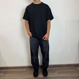 Jean de hombre color gris con efecto acid wash, de corte mom fit.