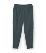 Pantalón deportivo de corte ajustado, confeccionado en tejido de poliéster texturizado color negro. Presenta cintura elástica con cordón de ajuste, bolsillos laterales con cierre y puños elásticos en los tobillos.