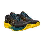 Championes de trail running Asics Gel-Trabuco 11, color negro con detalles en amarillo, azul y plateado. Cuentan con tecnología GEL para amortiguación y suela con tracción para terrenos irregulares.