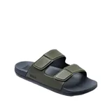 Sandalias Reef Cushion Tradewind color verde con base negra y correas ajustables con velcro.