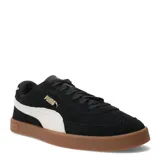 Championes Puma Club II Era Suede de estilo retro, confeccionados en gamuza negra con la icónica franja lateral en color blanco. Presentan suela de goma color caramelo y logo de la marca en dorado en el lateral.