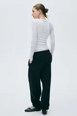 Pantalón de jogging negro de tiro alto en felpa de mezcla de algodón, con cordón ajustable en la cintura y elástico en cintura y bajos.