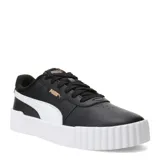 Championes Puma modelo Carina 3.0, de diseño urbano inspirado en los años 80. Presentan una capellada de cuero sintético en color negro con la icónica franja lateral Formstrip en blanco. Cuentan con una suela de plataforma blanca con textura acanalada y plantilla SoftFoam+ para mayor amortiguación.