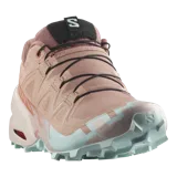 Calzado de trekking Salomon modelo Speedcross 6, en tonos gris y verde claro, diseñadas para trail running con suela de gran tracción y cordones de ajuste rápido.