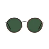 Lentes de sol Indie Malcom con montura redonda de madera color ébano y lentes verdes.
