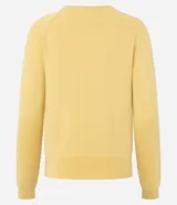 Suéter de punto color beige, con cuello redondo y mangas largas. Diseño básico y versátil de calce cómodo.