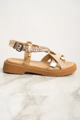 Sandalias con plataforma color suela, tiras cruzadas en cuero color dorado, rosa y animal print.