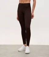 Legging deportiva de tiro alto confeccionada en microfibra acanalada, con diseño ajustado y textura acanalada.