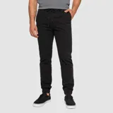 Pantalón jogger negro de corte relajado, con cintura elástica con cordón ajustable y puños elastizados en los tobillos.