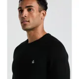 Sweater de punto negro con textura de panal, cuello redondo y mangas largas, con el logo del pingüino bordado en el pecho.