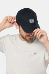 Gorro con visera azul de lona con parche frontal con logo Legacy & Co.