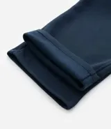 Pantalón de corte recto confeccionado en tejido de algodón y poliéster, con cintura elástica ajustable mediante lazo y bolsillos laterales.