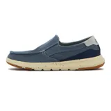 Zapato casual de hombre tipo slip-on, color azul marino, confeccionado en denim con detalles elásticos en los laterales para mayor comodidad, suela beige moteada y refuerzo trasero con la inscripción "Country".