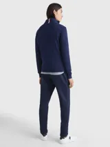 Sweater azul marino de Tommy Hilfiger, confeccionado en mezcla de algodón y cachemira, con cuello alto y cremallera de un cuarto.