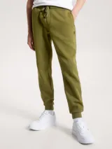 Pantalón de jogging verde oliva de corte cónico, con cintura elástica ajustable con cordón, bolsillos laterales ribeteados, bolsillo trasero de ojal y monograma TH bordado en el lateral.