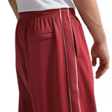 Pantalon de jogging Nike Sportswear Club, color negro con cordón ajustable en la cintura y logo de la marca bordado en blanco. Presenta una línea lateral blanca a lo largo de cada pierna.