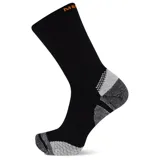 Medias deportivas negras para trail running, con amortiguación media, refuerzos en gris en el talón y la puntera, compresión en el arco y detalles de la marca en naranja en el elástico superior.
