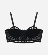 Soutien alargado Lov de color negro, confeccionado en tul con diseño geométrico y transparencias, copas con soporte y breteles finos regulables.