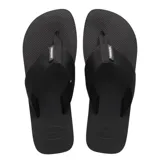 Sandalias tipo ojotas Havaianas modelo Urban Basic, color negro, con tiras de tela y base de goma con textura antideslizante.