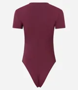 Body de cuello redondo y manga corta, confeccionado en tejido de poliamida con elastano. Presenta un diseño liso y ajustado al cuerpo con cierre en la entrepierna.