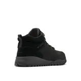 Bota de senderismo de caña media Columbia, color negro, confeccionada en material textil impermeable con refuerzos de gamuza en el talón y cuello. Cuenta con puntera de goma resistente a la abrasión, sistema de cordones con ganchos metálicos y suela de caucho con tecnología Omni-Grip para mayor tracción.