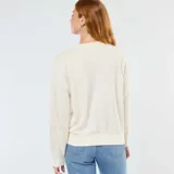 Buzo de cuello redondo confeccionado en felpa francesa, con mangas largas y puños y ruedo acanalados.