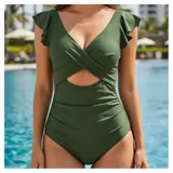 Malla entera azul con diseño cruzado en el frente, aberturas laterales, volados en los hombros y efecto control de abdomen.