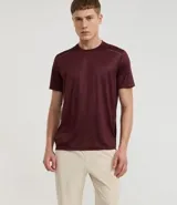 Pantalón deportivo masculino de microfibra color negro, corte recto, con cintura elástica y bolsillos con cremallera. Confeccionado en poliéster y elastano.