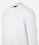 Remera de manga larga con cuello redondo y textura, de corte regular. Confeccionada en una mezcla de algodón, poliéster y viscosa.