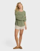 Sweater Billabong Open Air de tejido de punto rústico, color verde militar, con escote en V pronunciado y mangas largas holgadas de caída relajada.